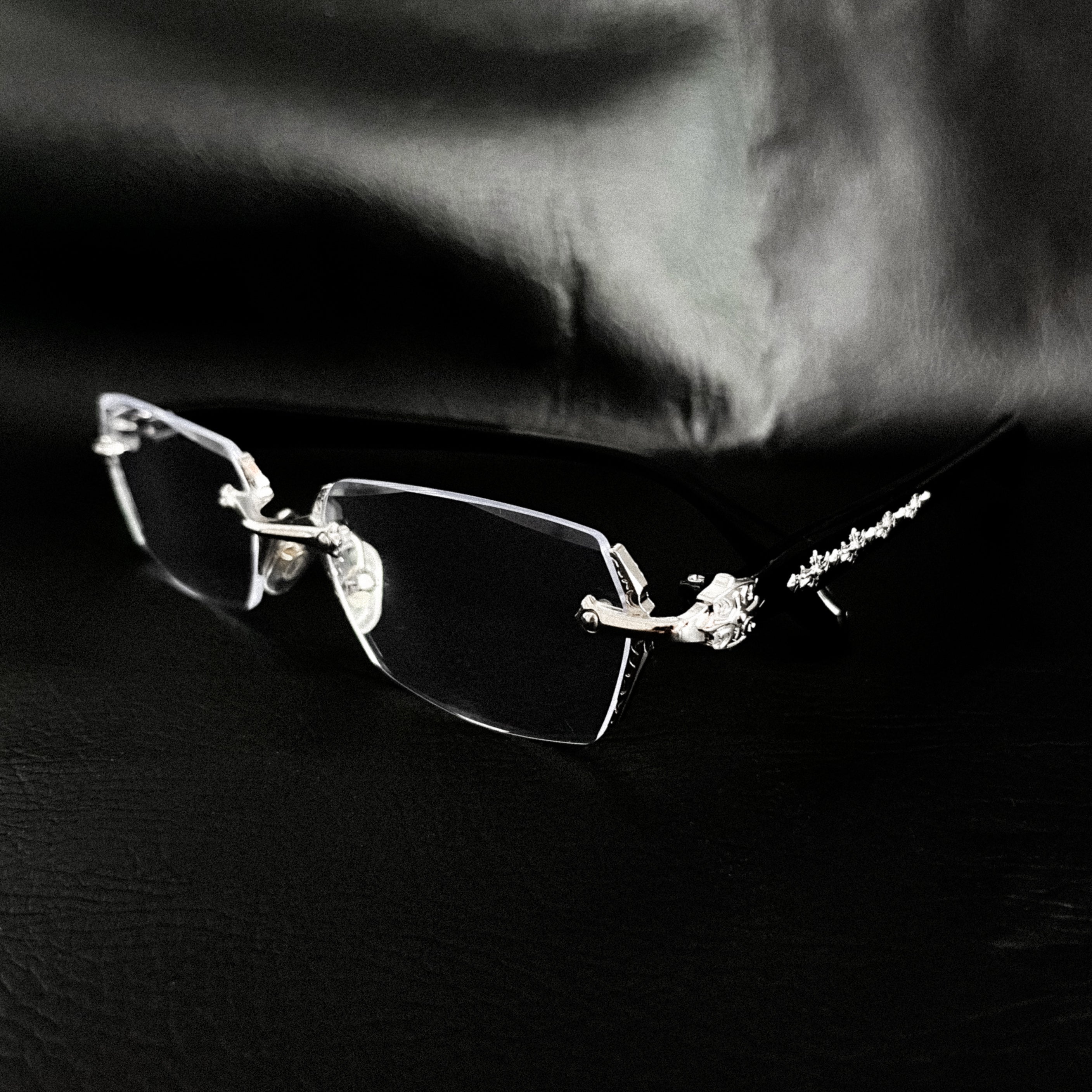 Rimless Chrome Cross Glasses CH